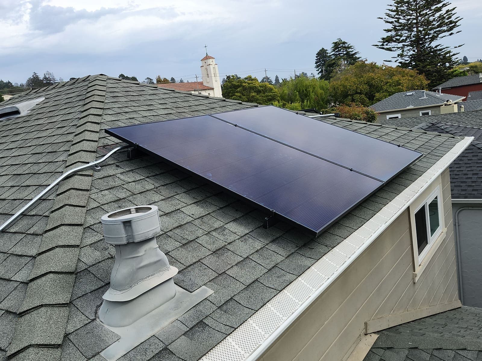 A compact solar array fitted to a single small roof plane